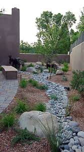 Design ideas for a small asian river rock garden path in philadelphia. Top 50 Best River Rock Landscaping Ideas Hardscape Designs