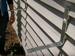 Raise or lower the second bracket until the two are level. 5 Easy Steps To Hang Window Boxes