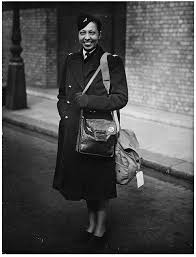 Josephine Baker 1945. Wearing military uniform and coat ...