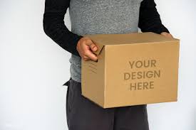 Download Premium Psd Of Man Carrying A Kraft Box Mockup 598473 Box Mockup Box Studio Psd