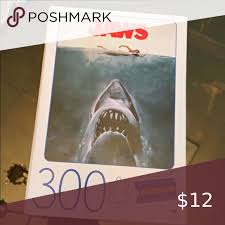 This list features some of the most famous blockbuster movies ever: Euc Jaws 300 Piece Puzzle 300 Piece Puzzles Jaws Movie Poster Jaws Movie