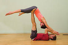 Many yoga poses can be practised with two people either where one person can help the other in a pose, or where you both do poses that are mutually supportive. Acroyoga Wikipedia