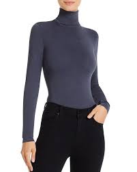 Colorado body i bomuldsblanding fra wolford med en ribstrikket rullekrave, lange ærmer og en formsyet silhuet. Wolford Colorado Stringbody Turtleneck Bodysuit Bloomingdale S