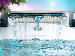 Mom and dad can relax in a secluded cave while the kids hava a ball in the pool! Exclusive 24 Waterfall Hot Tub Liquidators