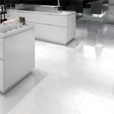 The hexagonal floor is juxtaposed by a string of white square tiles that line the walls and shower. Pin On Kajaria Ceramics