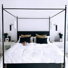 Paula Rallis Home On Instagram Spotted A Tiny Human Hiding Behind Our Maisondevacances Pillows Black Throw Pillows Black Canopy Bed Gold Bedroom