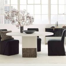 Concrete in the dining room? Savvy Favorites Contemporary Modern Round Dining Room Tables The Savvy Heart Interior Design Decor And Diy