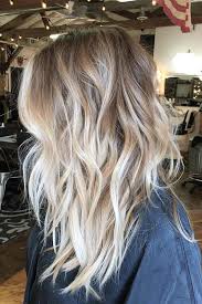 While the color of the hair reminds of on the '80s and grunge, the medium length shag haircut makes everything look romantic and pretty. Medium Length Hairstyles To Look Unique Every Day Glaminati