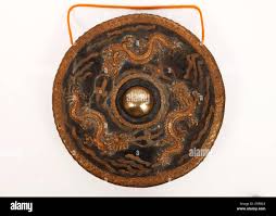 Authentic cast Chinese or Thai Nipple gong with three Dragons chasing each  other Stock Photo - Alamy
