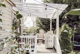 Attach a pergola to your house and you'll have an instant outdoor room you can use 24×7. Diy Clear Corrugated Covered Pergola Attached To The House And An Existing Deck Rain And Pine