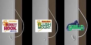 To use, simply pull down on a single strip of wood and hang. Monkeyhook Drywall Picture Hanger Monkey Hook