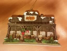 Christmas ornament cracker barrel snowman peppermint pail, metal. Winifred Winnie Garvin S Cracker Barrel Christmas Ornament Courtesy Las Vegas Review Journal