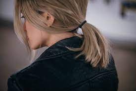 Long Bob Pulled Back Into A Short And Stubby Ponytail Pieces Of Hair Closest To Face Falling Forward Out Of Short Hair Styles Hair Styles Short Hair Ponytail