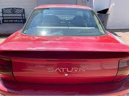 Image result for Brilliant Red 1995 Saturn