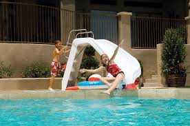 It's time to kick up the fun and enjoyment. Fun In The Sun With Modern Pool Toys And Slides Splash Magazine