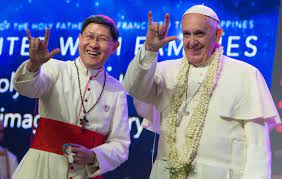 Satanism is the worship of satan, typically involving a travesty of christian symbols and practices, such as placing a cross upside down. Metal Pope Pope Francis Flashes Familiar Hand Signs In Philippines Los Angeles Times
