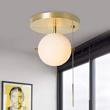 Many of our flush mount ceiling lights allow you to choose a matching light shade separately, giving you the flexibility to match a light fixture to your home's unique style. Gidu Mid Century Pull Chain Ceiling Light Globe Glass Shade Semi Flush Mount Metal In Gold Semi Flush Mount Ceiling Lights Lighting
