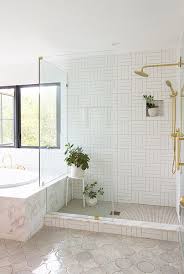 The fixtures and fittings match exceptionally, with the colored tones all being consistent. 20 White Bathrooms That Give Sleek A New Meaning Lonny