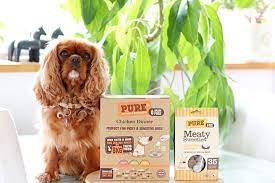 Pure Pet Food Chicken Dinner And Meaty Bites Next To Cavalier King Charles Spaniel Cavs Spaniels Cavalier King Charles King Charles Spaniel Cavalier