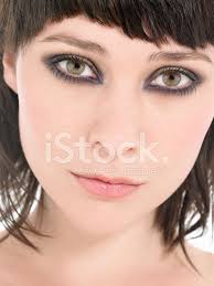 young woman wearing heavy eye makeup