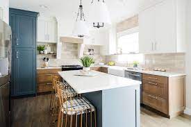 Farmhouse kitchen decor and also design concepts pulls at the heart as it draws the detects with aspects of an earlier, simpler time. Brown And Blue Kitchen Cabinets Transitional Kitchen