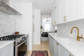 Remove the wall studs from the opening. Renovating A Galley Kitchen Adds A Bright Pass Through Sweeten Com
