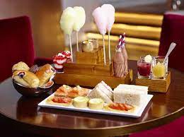 A Scrumdiddlyumptious Afternoon Tea Inspired By Charlie And The Chocolate Factory Christmas Afternoon Tea Food Afternoon Tea