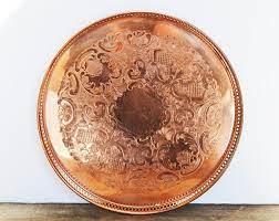 Free shipping on many items. Vintage Copper Large Round Serving Tray Venetian Copper 12 Across With Reticulated Sides And Etched Design Vintage Copper Unique Items Products Vintage Love