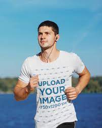 Download Placeit T Shirt Mockup Of A Young Man Running By A Lake