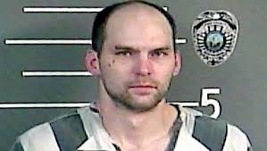 Police: Sleepy burglar found hiding under sheet