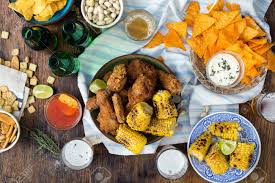 The vegetables infuse the braising liquid, which cooks down into a flavorful pan sauce for the meat. Party Dinner Table Concept Fried Chicken Beer And Snacks To Stock Photo Picture And Royalty Free Image Image 85261447
