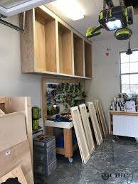 It is also often used in kitchens and interior cabinets, wall shelving systems typically consist of supporting bands that are installed along. Diy Cabinets For A Garage Workshop Or Craft Room Shanty 2 Chic