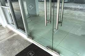 Often imitated but never matched, this system provides. Close Up Of Glass Doors In To Office Room With Stainless Steel Stock Photo Picture And Royalty Free Image Image 77668480