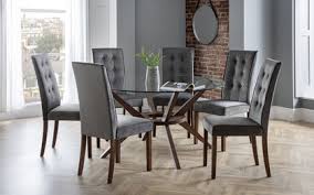 The extending dining set is available with 4 to 6 dining chairs in both standard and carver designs. Euston 1 4m Glass Round Dining Table 6 Chairs