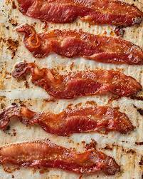 Bacon's history dates back thousands of years to 1500 b.c. How To Make Bacon In The Oven The Simplest Easiest Recipe Kitchn