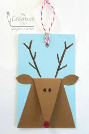 Rock band, futurama (new movie), scrubs season 6, a beanie with headphones built in, around $300 (more coming), and all the candy i've ever seen in my life (plus socks, sweaters, ect.) were all perks. Reindeer Gift Tags Christmas Card Crafts Christmas Cards Handmade Christmas Gift Tags