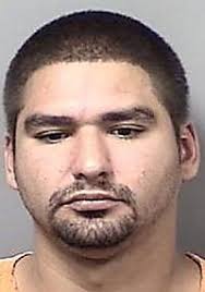 As police review footage, suspect rides by