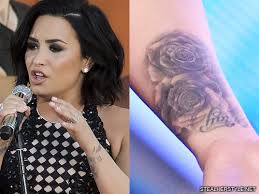 It also symbolizes leo, the fifth sign of the zodiac. Demi Lovato S Tattoos Meanings Steal Her Style