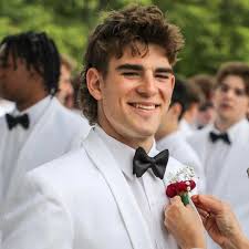 My baby graduated from Mount Saint Joseph High School yesterday in a  beautiful ceremony at the Cathedral of Mary our Queen. The young men looked  so handsome in their white tuxes! I'm