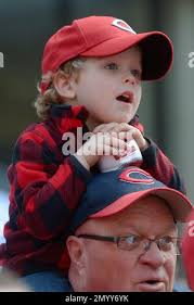Cincinnati Reds fan Spencer Bode sits