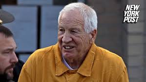 Penn State football coach Jerry Sandusky still maintains innocence, wife  stands by side