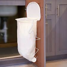 Hang securely over the top drawer or cabinet door, every time you want to clean the countertops, just throw trash in it and keep your kitchen clean. Original Kitchen Rack Trash Bag Holder In White Bed Bath Beyond