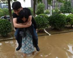 Boyfriend x girlfriend is what i live for. Woman Carries Her Boyfriend On Her Back While Crossing A Flooded Street Daily Mail Online
