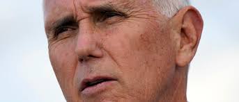 Pence takes lead role in campaign with Trump travel stopped