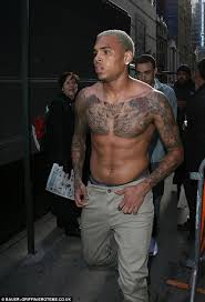 Chest tattoo drawings rose chest tattoo torso tattoos chest piece tattoos cool chest tattoos chest tattoos for women cool forearm tattoos stomach tattoos old. Chris Brown Gets More Tattoos On His Neck As He Snoozes While Getting Needled Daily Mail Online