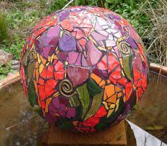 Use a dry cloth to wipe away most of the excess grout. 190 Mosaic Balls Ideas In 2021 Mosaic Mosaic Garden Mosaic Bowling Ball