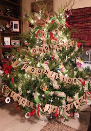 A christmas tree stands at the center of this christmas tree holiday church website banner with a modern style design of shapes overlaying the tree like ornaments. Names Of God Christmas Tree Banner Christmas Banners Happy Birthday Jesus Christmas Wreaths