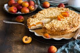 Kurz bevor sie den kuchen aus dem ofen holen, tropfen sie die aprikosen ab. Aprikosen Kasekuchen Mit Streusel Cookie Und Co