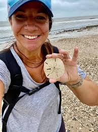 Finding shells with my 8-year-old snorkeling companion
