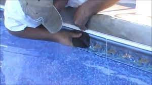 This pool liner lock is a great way to keep your pool liner secure and in place without the need to bend over or use tools. How To Get Your Vinyl Pool Liner Back In The Track Youtube